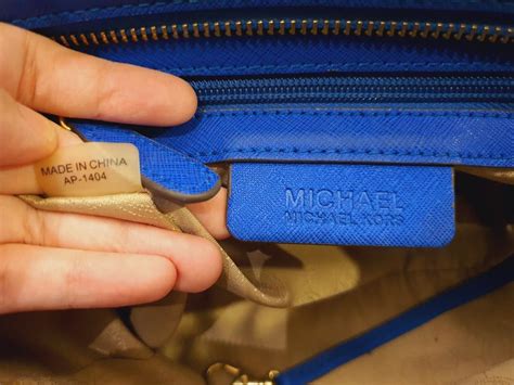 michael kors wallet serial number check|michael kors smartphone wallet.